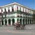 Old buildings in Havana beg for paint, while scarce dollars are diverted to higher priorities.